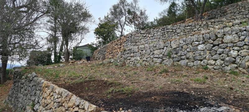 Réparation de mur en pierres sèches à MOUANS SARTOUX prés de Cannes